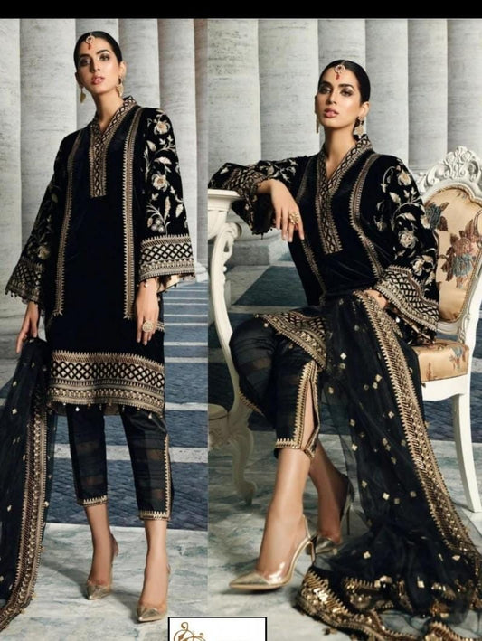 Anaya beauty black and gold traditionaloutfit with intricate patterns in an elegant setting.