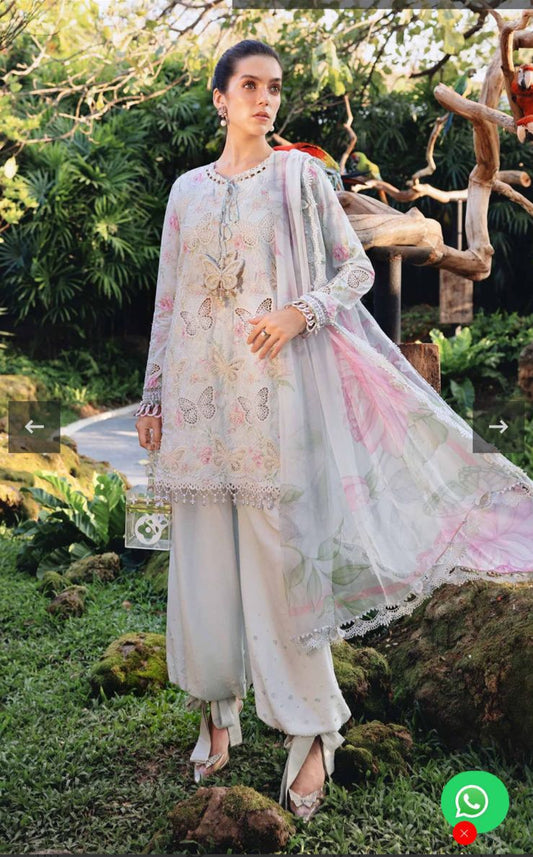 MAria b Most Demanding Butterfly New 2026 floral dress standing in a garden setting