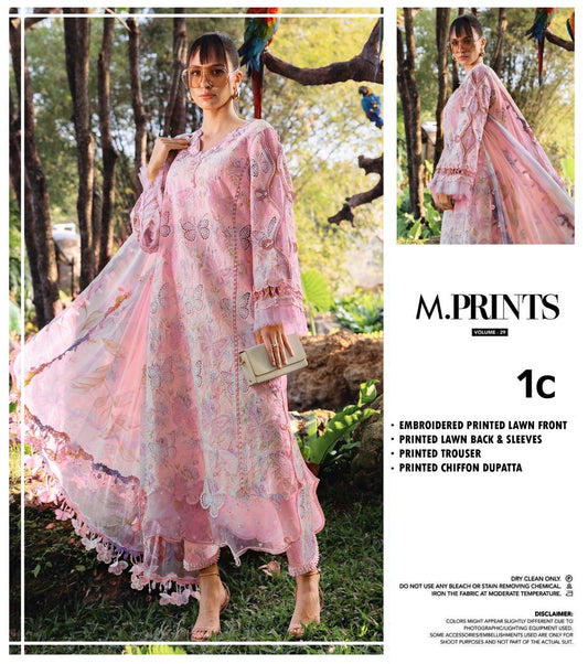 Woman in a pink embroidered dress standing outdoors with promotional text for M. Prints clothing line.
