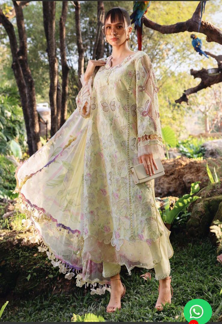 Maria b M Print MBT-2901-B Lemon New Butterfly floral dress standing in a garden
