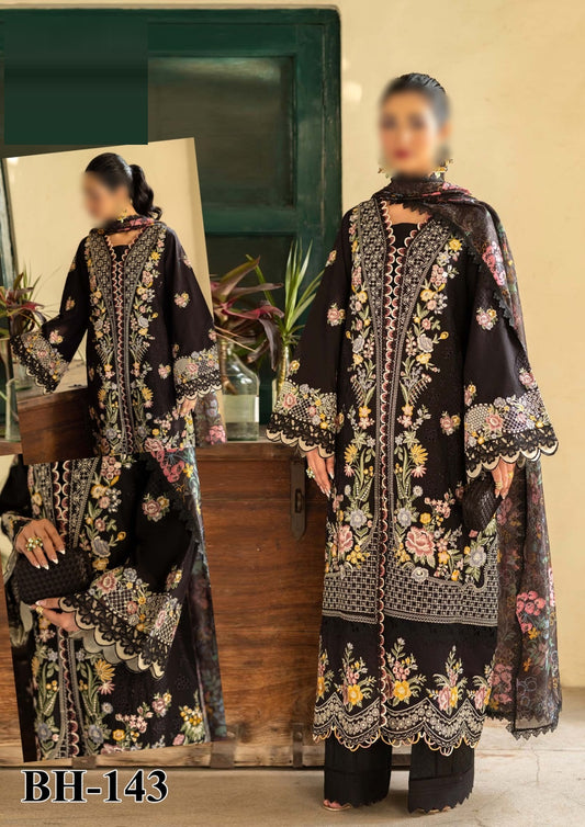 Maryam Hussain Black BEauty Dress embroidered black outfit with floral patterns in a room.