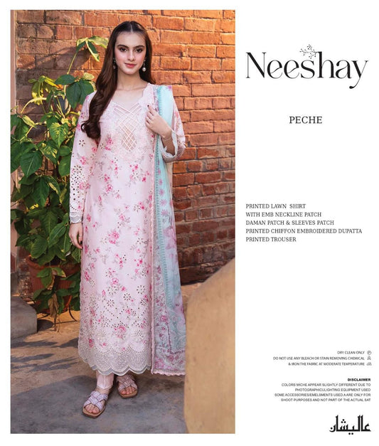 Neeshay PECHE  floral dress with a dupatta against a brick wall, featuring the brand 'Neeshay'.