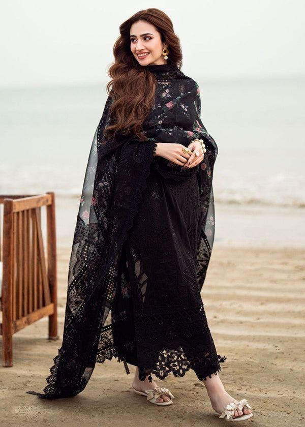 Nureh Black Sana Jawed standing on a beach