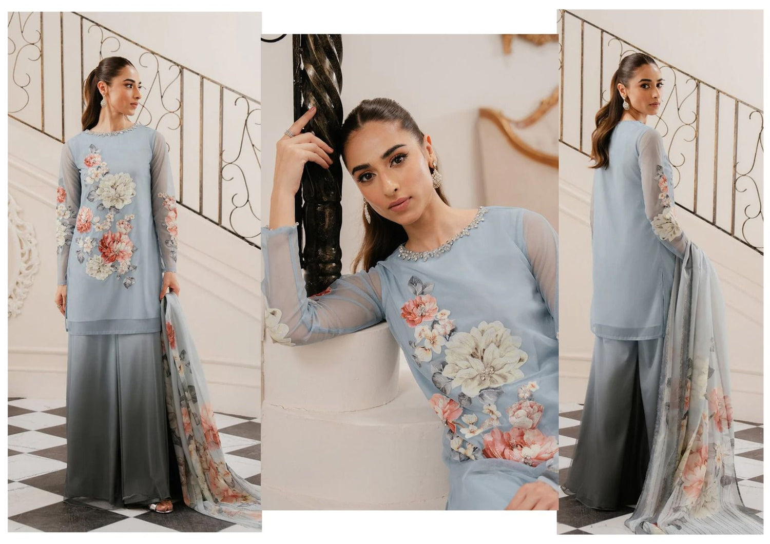 Lulusar Most Demanding Silk SKy Dress Woman wearing a light blue embroidered dress with floral patterns in a home setting.