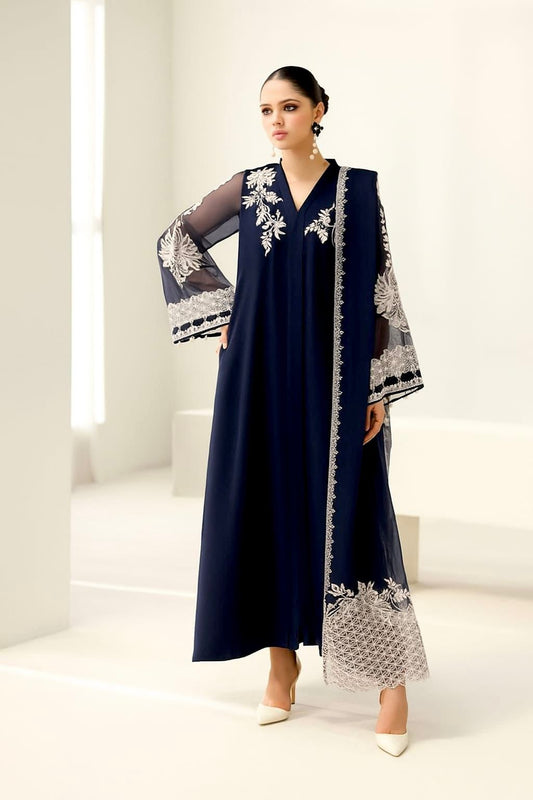 BAroque Luxury Navy Blue Pakistani Dress Woman wearing a navy blue dress with white floral embroidery 